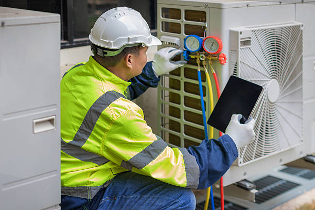 Professional Hvac technician working in Utica, IN